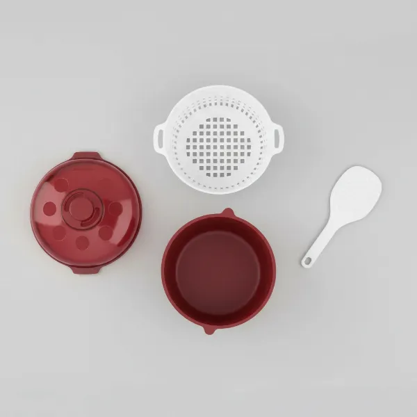 Close-up view of the Joseph Joseph M-Cuisine Microwave Rice Cooker, showing its modular components: main pot, strainer, lid, and paddle.